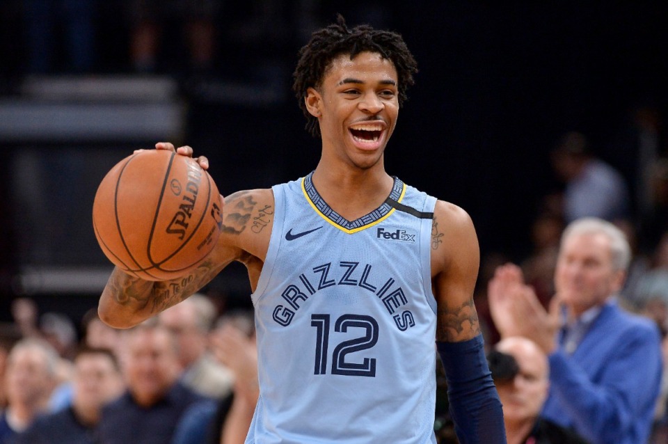 <strong>Memphis guard Ja Morant reacts while the Grizzlies run out the clock in an NBA basketball game against the Houston Rockets on Tuesday, Jan. 14, 2020, at FedExForum.</strong> (AP Photo/Brandon Dill)