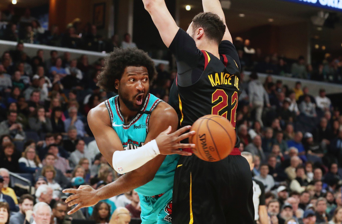 <strong>Memphis Grizzlies forward Solomon Hill (44) passes the ball around Cleveland Cavaliers forward Larry Nance Jr. (22) Friday, Jan. 17, 2020, at FedExForum.</strong> (Karen Pulfer Focht/AP)