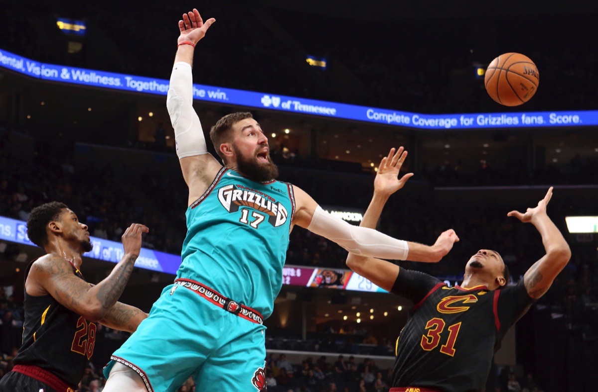 <strong>Memphis Grizzlies center Jonas Valanciunas (17)) and Cleveland Cavaliers forward John Henson (31) vie for a rebound Friday, Jan. 17, 2020, at FedExForum.</strong> (Karen Pulfer Focht/AP)