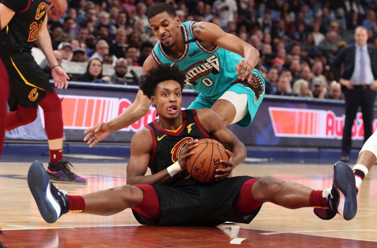 <strong>Memphis Grizzlies guard De Anthony Melton (0) defends against Cleveland Cavaliers guard Collin Sexton Friday, Jan. 17, 2020, at FedExForum.</strong> (Karen Pulfer Focht/AP)