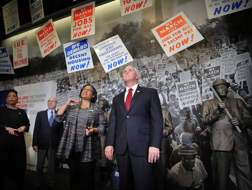 <strong>Noelle Trent, (left) with the National Civil Rights Museum shows Vice President Mike Pence around the museum during Pence's trip to Memphis on Jan. 19, 2020. Pence visited the Civil Rights Museum and the Holy City Church of God In Christ to honor one of his professed heroes Dr. Martin Luther King Jr.</strong> (Patrick Lantrip/Daily Memphian)
