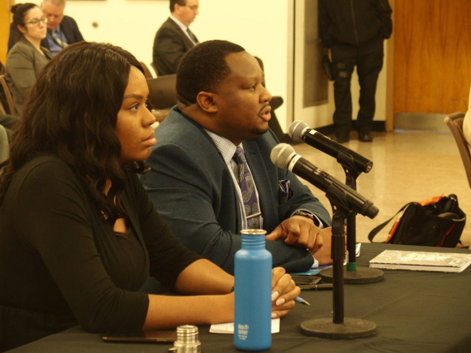 <div class="wp-caption-text"><strong>Tyree Daniels (right), board chair for Memphis College Preparatory, speaks to Shelby County Schools board members during a hearing on the school's contract renewal.</strong> (<span>Laura Faith Kebede/Chalkbeat)</span></div>