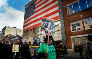 <strong>Dorothy Jones joins several hundred others as they walk toward the National Civil Rights Museum during the 35th Annual Dr. Martin Luther King Jr., Birthday Parade Monday, Jan. 20.</strong> (Mark Weber/Daily Memphian)