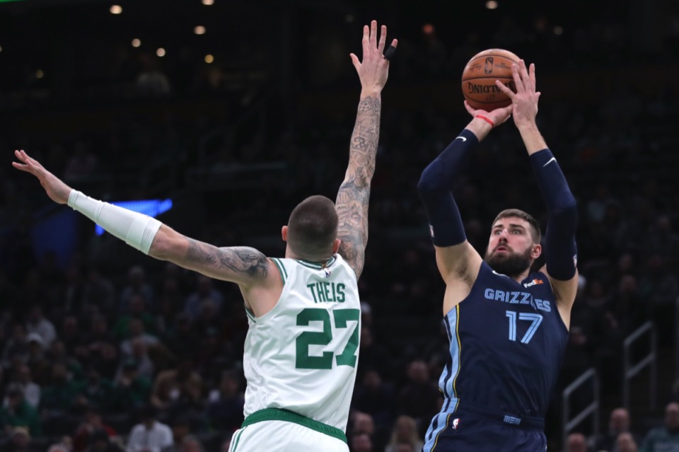 <strong>Memphis Grizzlies center Jonas Valanciunas (17) shoots over Celtics forward Daniel Theis (27) Jan. 22, 2020, in Boston.</strong> (Charles Krupa/AP)