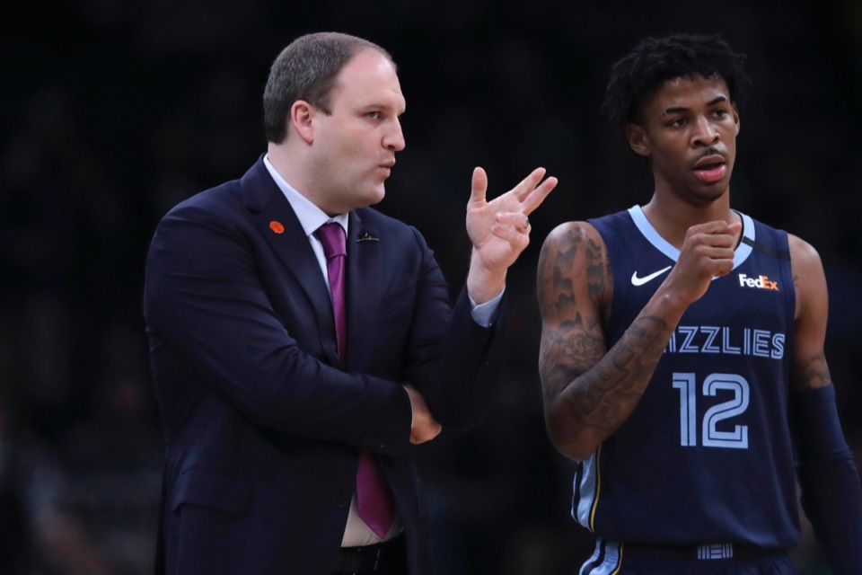 <strong>Memphis Grizzlies head coach Taylor Jenkins, left, talks with Memphis Grizzlies guard Ja Morant (12) in the game against the Celtics in Boston Jan. 22, 2020.</strong> (Charles Krupa/AP)