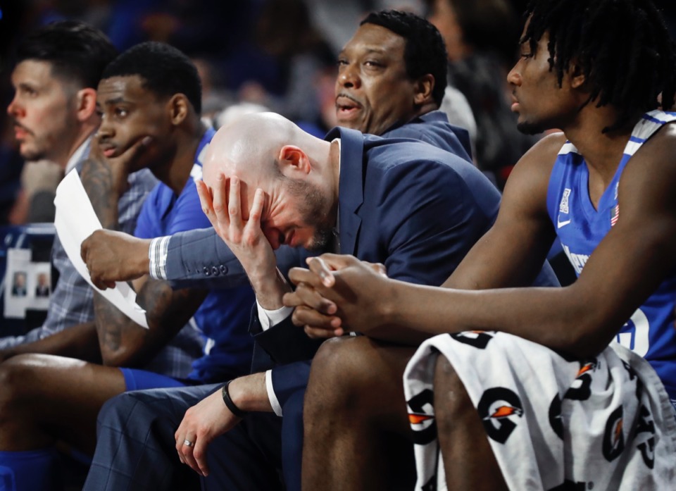 <strong>Memphis assistant coach Cody Toppert (middle) reacts on the bench during the final seconds of an 80-40 loss to the Golden Hurricane Wednesday, Jan. 22, 2020, in Tulsa, Oklahoma.</strong> (Mark Weber/Daily Memphian)