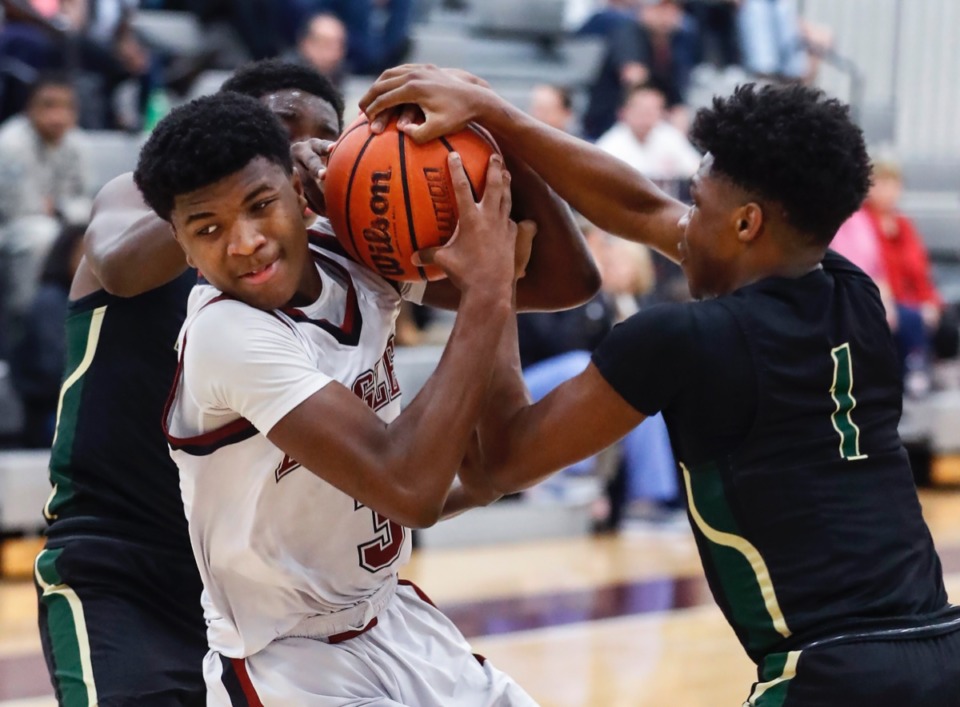 <strong>ECS guard Kameron Jones (left, in a game against FACS Jan. 14) is averaging 19.9 points per game and falls at No. 11 on this week's leaders list.</strong> (Mark Weber/Daily Memphian)