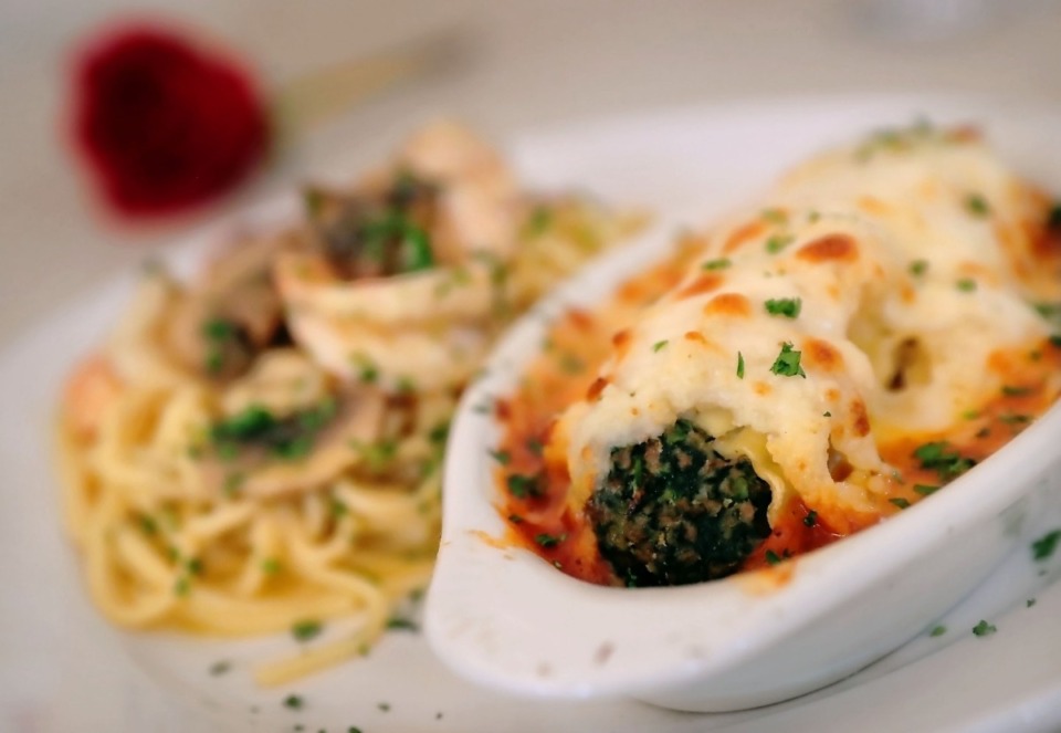 <strong>The Elfo Special at David Grisanti's Italian restaurant is hand-rolled manicotti filled with beef, sausage and spinach filling baked with mozzarella and plated with sauteed shrimp and mushrooms in a butter cream sauce.</strong> (Jim Weber/Daily Memphian)