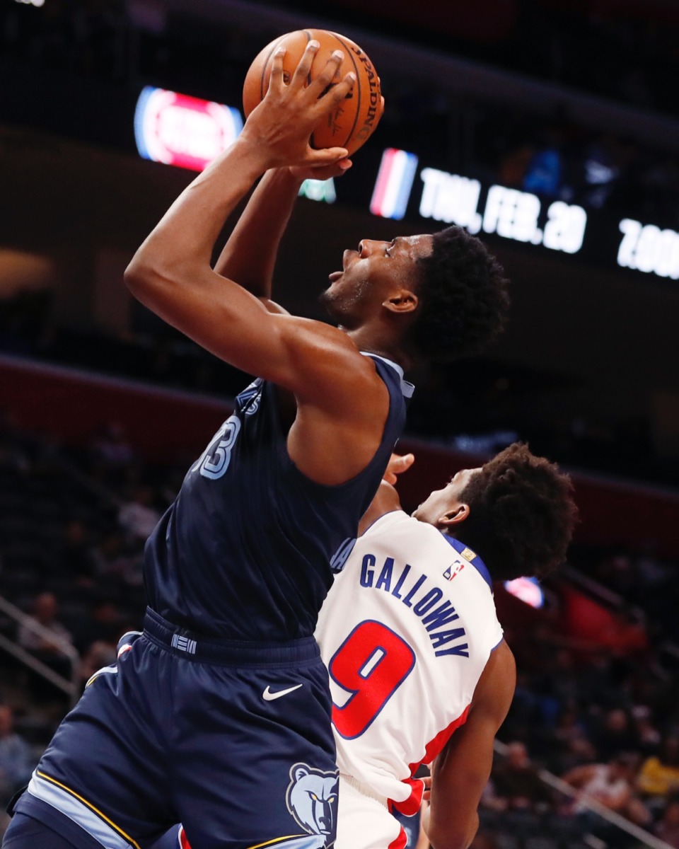 <strong>Memphis Grizzlies forward Jaren Jackson Jr. (13) shoots as Detroit Pistons guard Langston Galloway (9) defends during the first half of an NBA basketball game, Friday, Jan. 24, 2020, in Detroit.</strong> (Carlos Osorio/AP)
