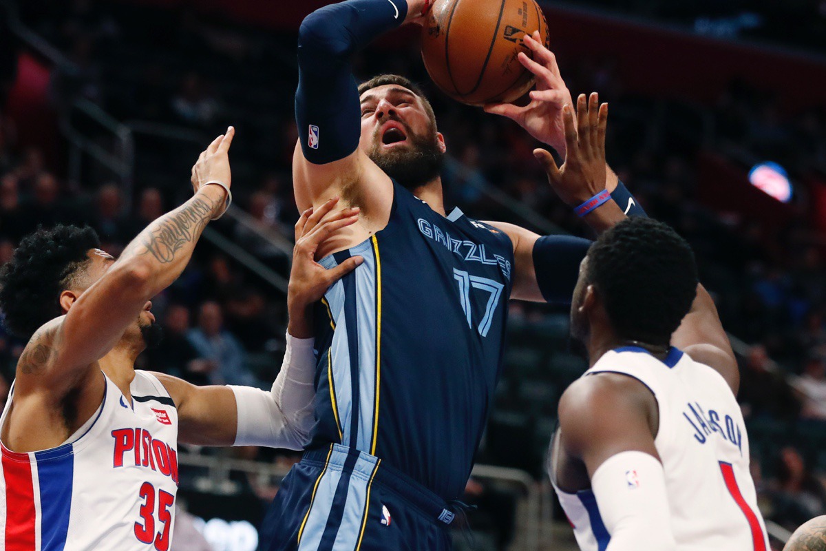 <strong>Memphis Grizzlies center Jonas Valanciunas (17) is fouled by Detroit Pistons forward Christian Wood (35) during the first half of an NBA basketball game, Friday, Jan. 24, 2020, in Detroit.</strong> (Carlos Osorio/AP)