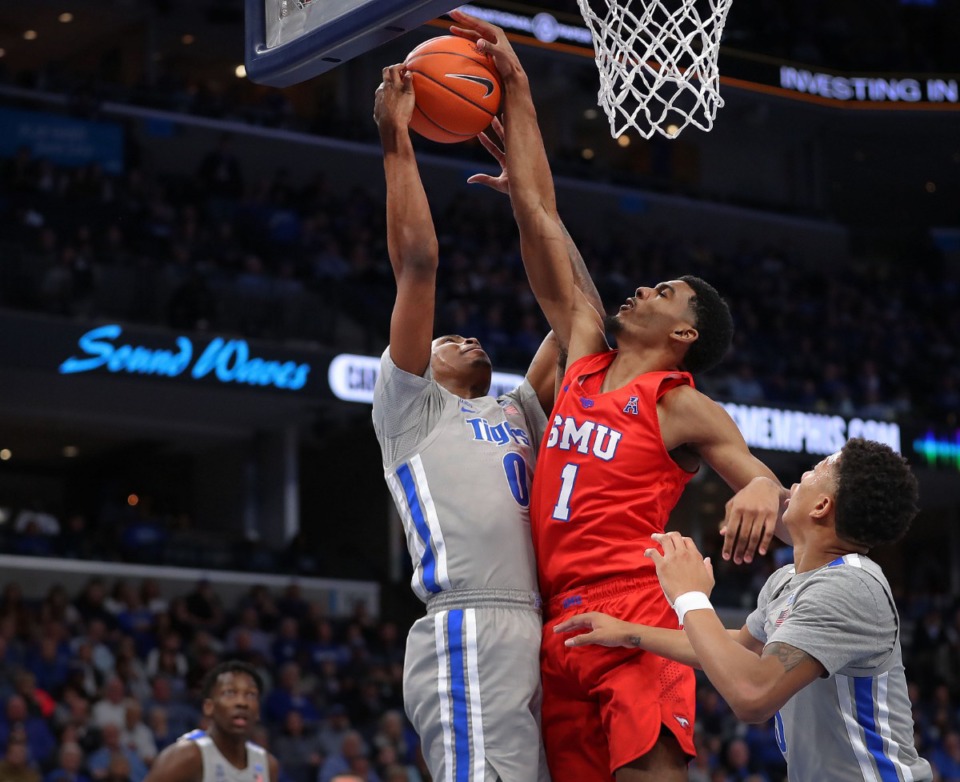 <strong>University of Memphis forward D.J. Jeffries (0) shoots under pressure by the Mustangs' Feron Hunt (1) during the Tigers' game on Jan. 25, 2020, against SMU at the FedExForum.</strong> (Jim Weber/Daily Memphian)