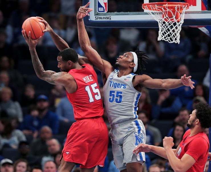 University of Memphis forward Precious Achiuwa (55) loses a rebound to the Mustangs' Isiah Mike (15) during the Tigers' game on Jan. 25, 2020, against SMU at the FedExForum. (Jim Weber/Daily Memphian)