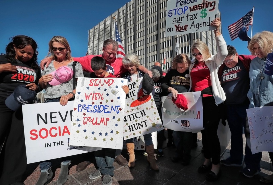 <strong>Supporters of President Donald Trump prayed during a rally on Oct. 17, 2019, at Civic Center Plaza.&nbsp;<span>&ldquo;We have so many people who care about this country,&rdquo; said organizer Charlotte Bergmann, who is running in the August Republican primary for Congress. &ldquo;And they feel like they are all alone, that no one else support and share their beliefs.&rdquo;&nbsp;</span></strong> (Jim Weber/Daily Memphian file)