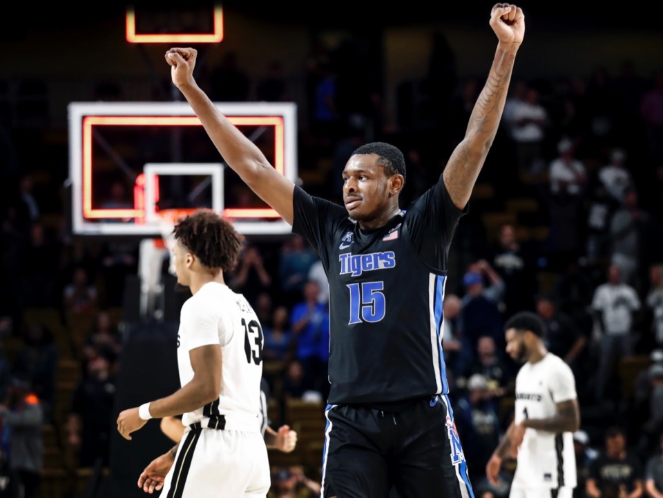 <strong>Memphis forward Lance Thomas (middle) celebrates a 59-57 victory over UCF on Wednesday, Jan. 29, 2020, in Orlando.</strong> (Mark Weber/Daily Memphian)