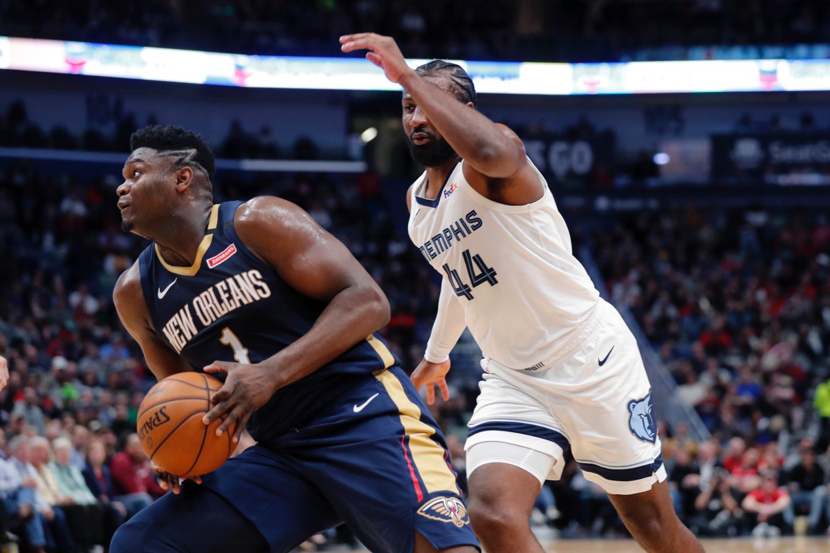 <strong>New Orleans Pelicans forward Zion Williamson (1) make a move to the basket next to Memphis Grizzlies forward Solomon Hill (44) in New Orleans, Friday, Jan. 31, 2020.</strong> (Gerald Herbert/AP)