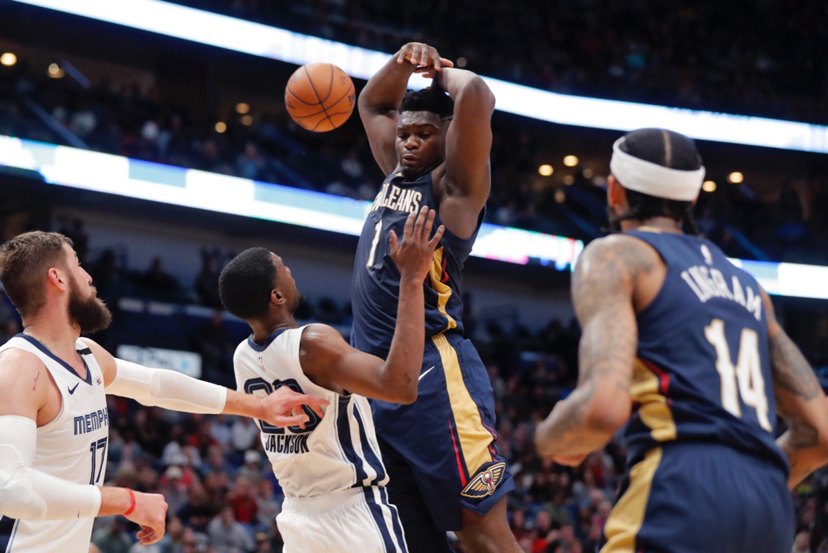 <strong>New Orleans Pelicans forward Zion Williamson (1) is fouled by Memphis Grizzlies guard Josh Jackson in New Orleans, Friday, Jan. 31, 2020.</strong> (Gerald Herbert/AP)