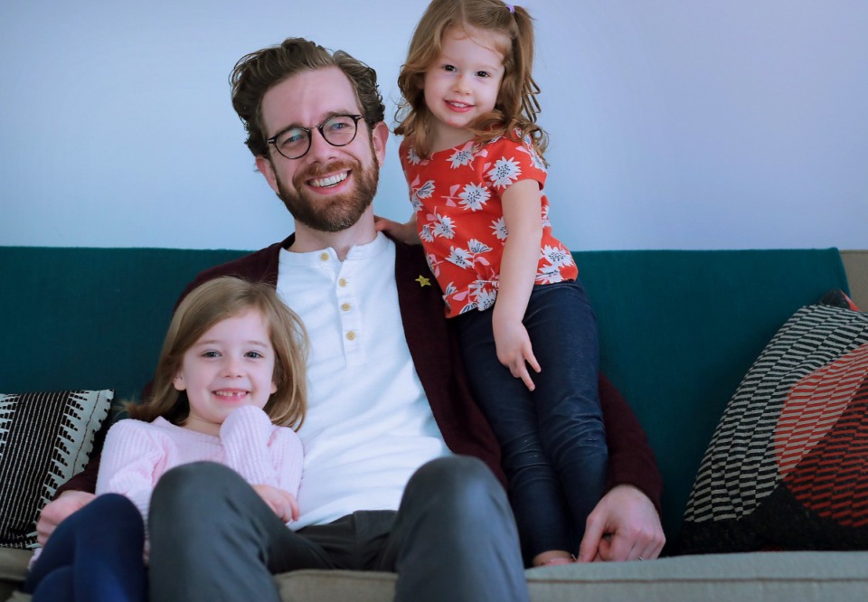 <strong>Inspired by parenting experiences with his daughters, 2-year-old Mira (right) and 6-year-old Ruby, Noah Glenn created a podcast in the office/studio at his Central Gardens home to help children practice relaxation techniques.</strong> (Jim Weber/Daily Memphian)