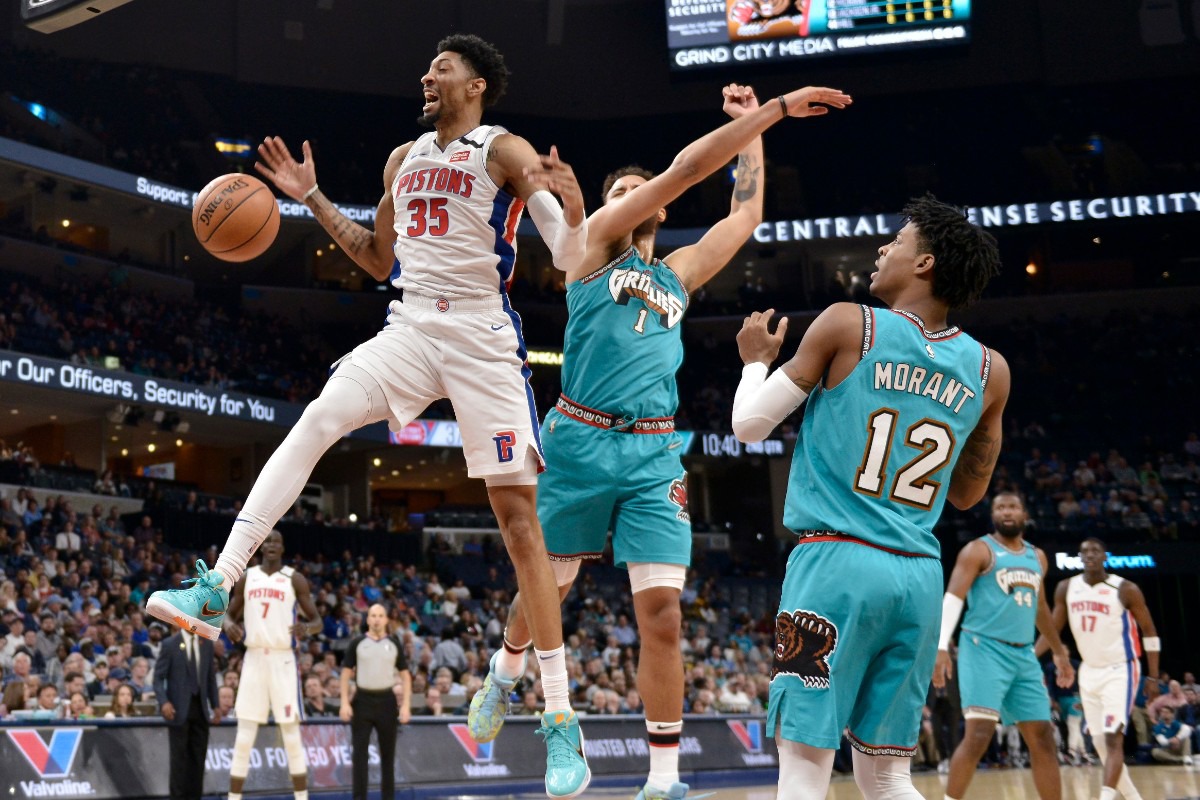 <strong>Detroit Pistons forward Christian Wood (35) scores against Memphis Grizzlies forward Kyle Anderson (1) and guard Ja Morant (12)</strong>&nbsp;<strong>Feb. 3, 2020, at FedExForum.</strong> (Brandon Dill/AP)