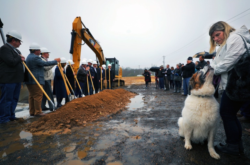 <strong>Gus the dog does his best to get the attention of Jean McGhee during the Lake District&rsquo;s groundbreaking Feb. 5, 2020. Groundbreaking signals the start of vertical construction for the $400 million mixed-use development in Lakeland.</strong> (Patrick Lantrip/Daily Memphian)