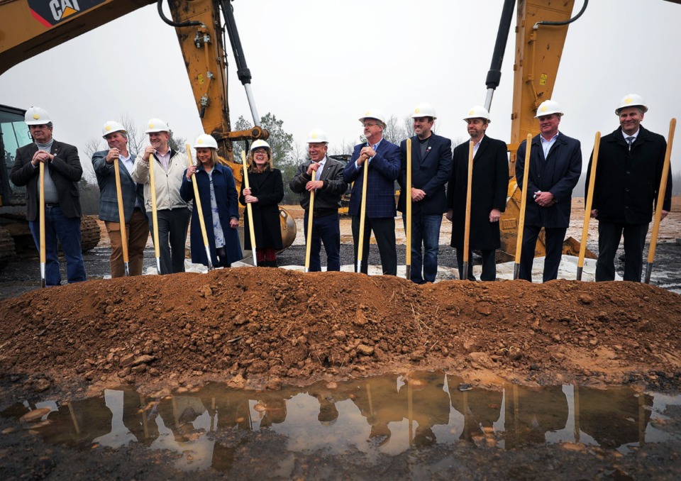 <strong>Lake District developer Yehuda Netanel (center) is flanked by contractors, designers, politicians and other stakeholders as he prepares to break ground Wednesday, Feb. 5, on the $400 million mixed-use development.</strong> (Patrick Lantrip/Daily Memphian)
