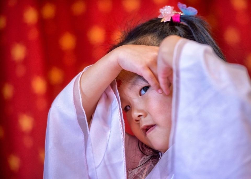 <strong>Dora Deng of the Greater Memphis Chinese School performs the Rain Dance at the Chinese New Year celebration at the Children's Museum of Memphis on Feb. 8, 2020.</strong> (Greg Campbell/Special to The Daily Memphian)