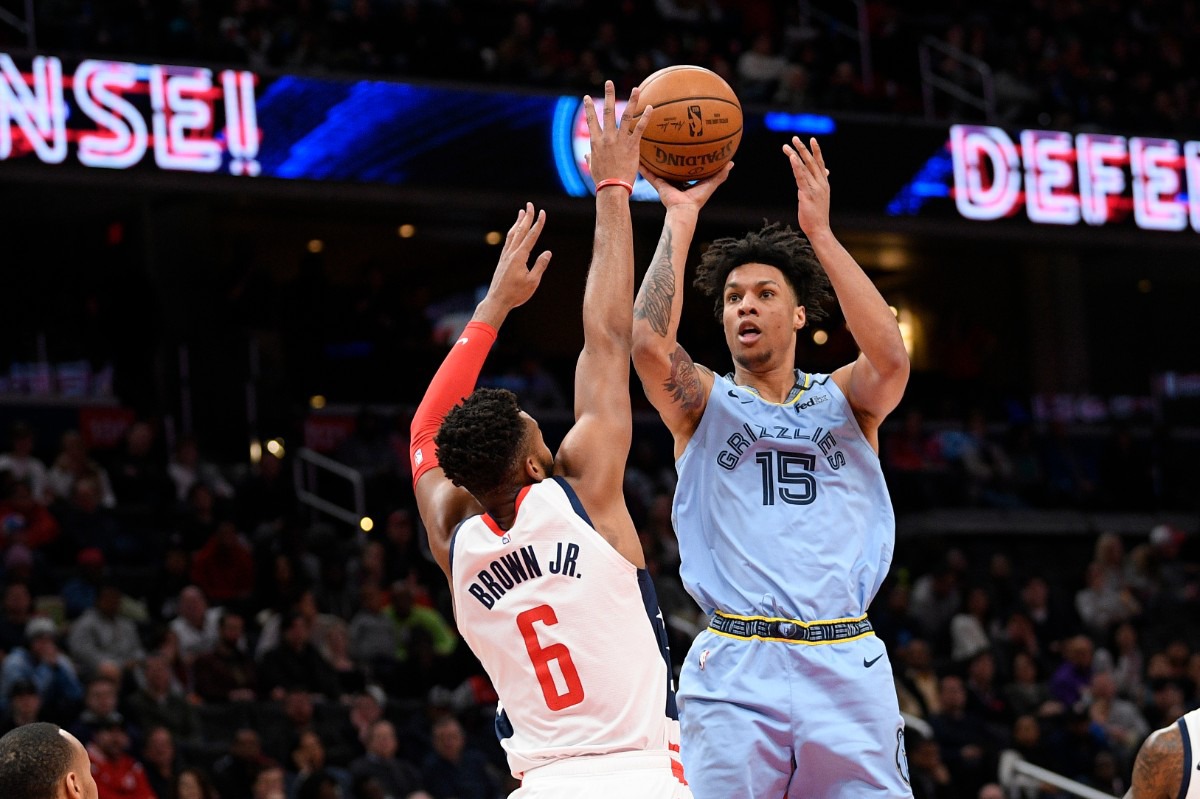 <strong>Memphis Grizzlies forward Brandon Clarke (15) shoots against Washington Wizards forward Troy Brown Jr. (6) during the first half of an NBA game on Feb. 9, 2020, in Washington.</strong> (AP Photo/Nick Wass)