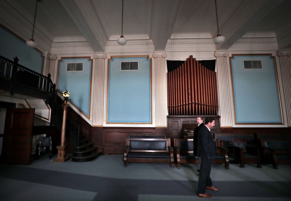 <strong>Jeff Higdon (right) and past master Mason and broker James McCraw, with the firm Avison Young, conduct a tour Feb. 8, 2020, of the Masonic Lodge on Court Avenue.</strong> (Jim Weber/Daily Memphian)