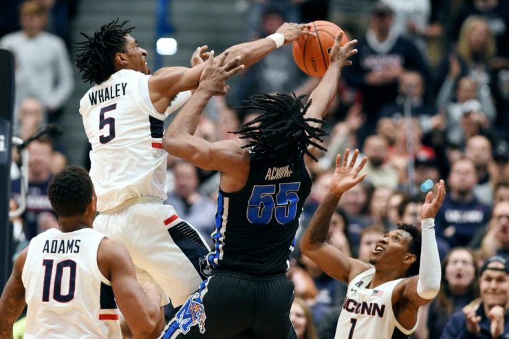 <strong>Connecticut's Isaiah Whaley (5) blocks a shot attempt by Memphis' Precious Achiuwa (55) during the second half of an NCAA college basketball game Sunday, Feb. 16, 2020, in Hartford, Conn.</strong> (Jessica Hill/AP)
