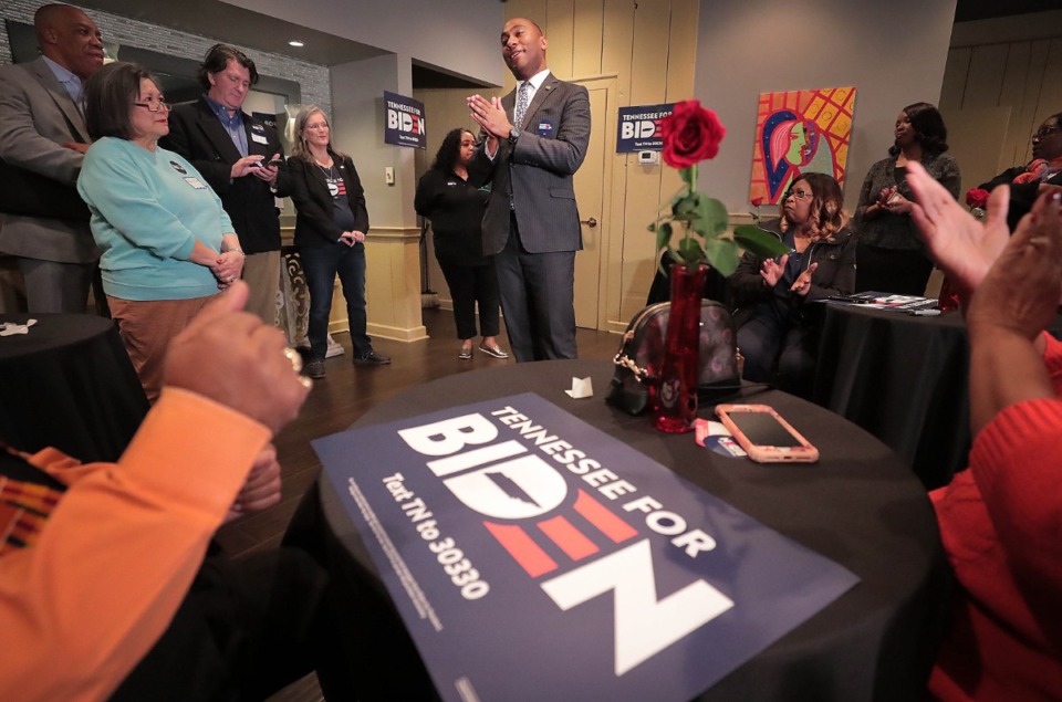 <strong>County Mayor Lee Harris (center) and State Sen. Raumesh Akbari (center left) talks to a group of Democrats at the Mahogany Restaurant on Feb. 15, 2020, during a Biden campaign rally to help boost early voter turnout.</strong> (Jim Weber/Daily Memphian)