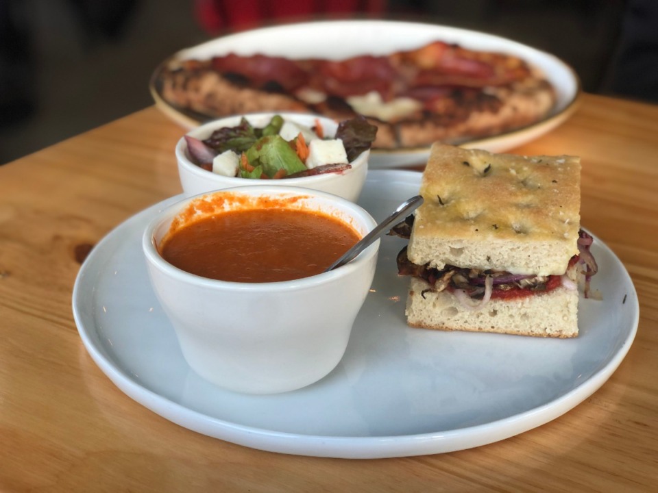 <strong>Everything on the lunch menu at Tamboli's Pasta &amp; Pizza is $10 or less. In front, the lunch special includes a half sandwich, cup of soup and a mini salad. The pizza in back is made for one but is hearty enough to split.</strong> (Jennifer Biggs/Daily Memphian)