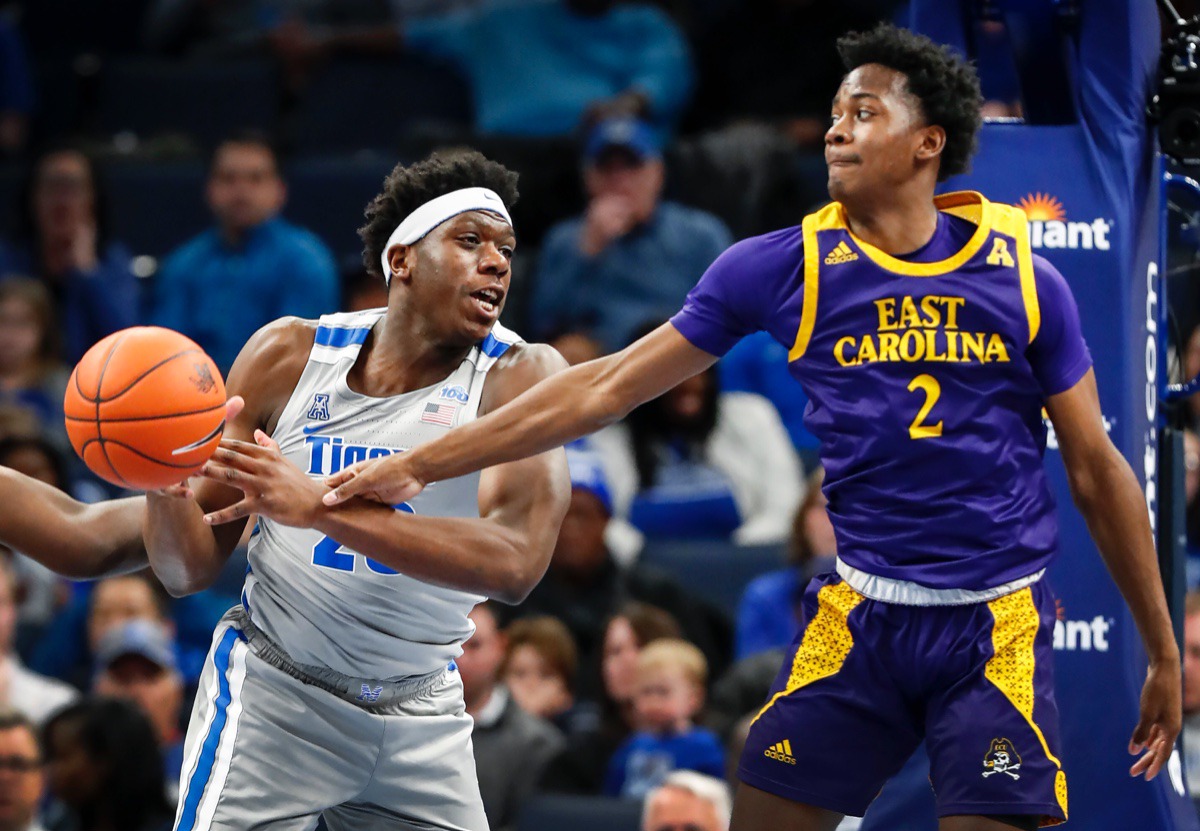 <strong>Memphis forward Malcolm Dandridge (left) battles ECU defender Tristen Newton (right) for a rebound Feb. 19, 2020, at the FedExForum.</strong> (Mark Weber/Daily Memphian)