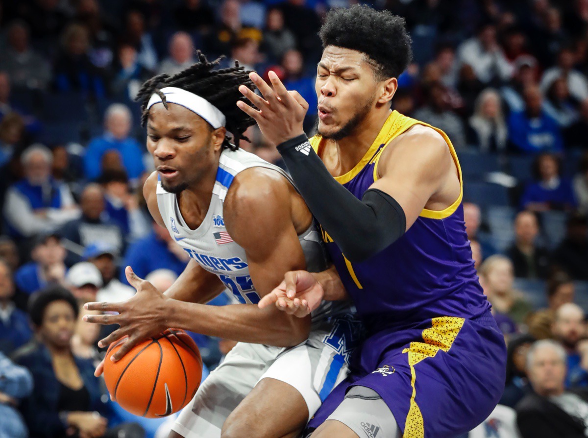 <strong>Memphis forward Precious Achiuwa (left) is fouled by ECU's Jayden Gardner (right) Feb. 19, 2020, at FedExForum.</strong> (Mark Weber/Daily Memphian)