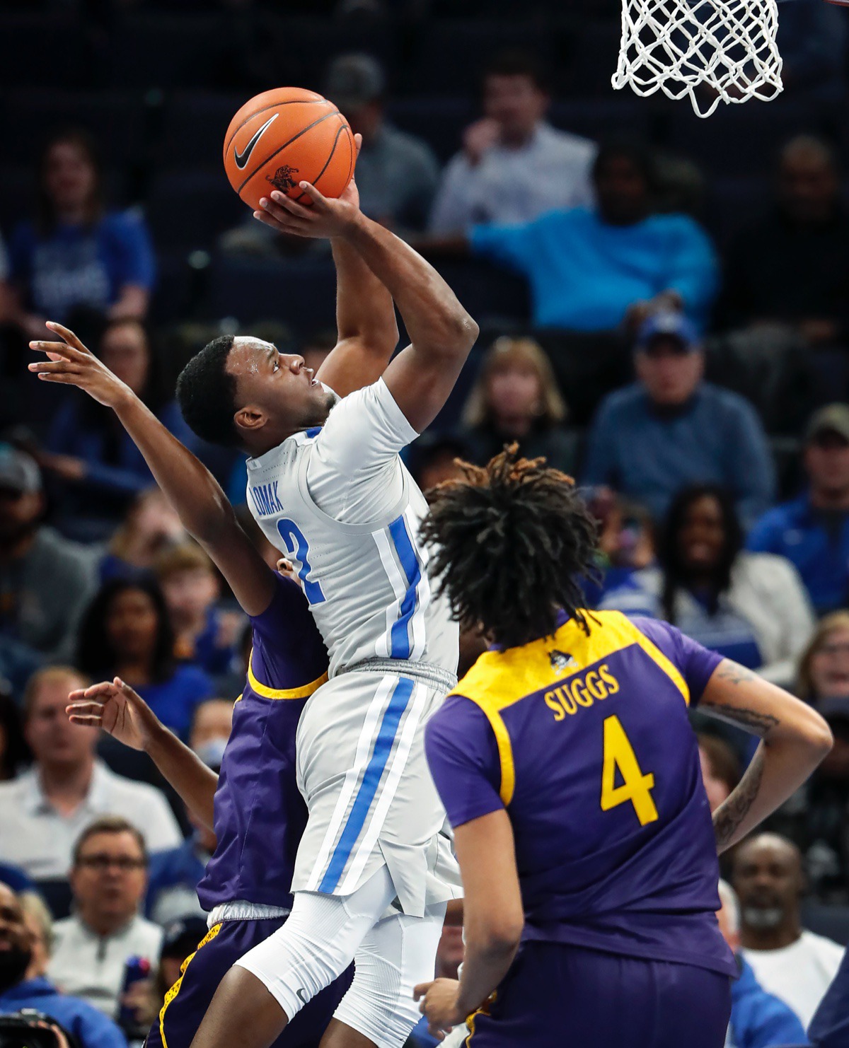 <strong>Memphis guard Alex Lomax (left) drives the lane against ECU Feb. 19, 2020, at FedExForum.</strong> (Mark Weber/Daily Memphian)