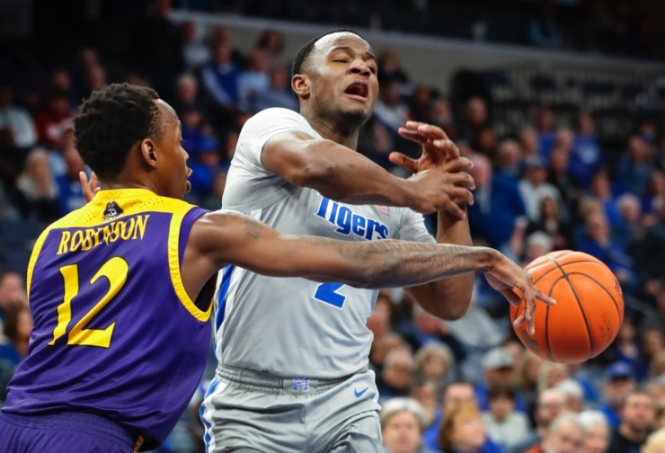 <strong>Memphis guard Alex Lomax (right) has the ball knocked away by ECU's Tremont Robinson-White (left) Feb. 19, 2020, at FedExForum.</strong> (Mark Weber/Daily Memphian)