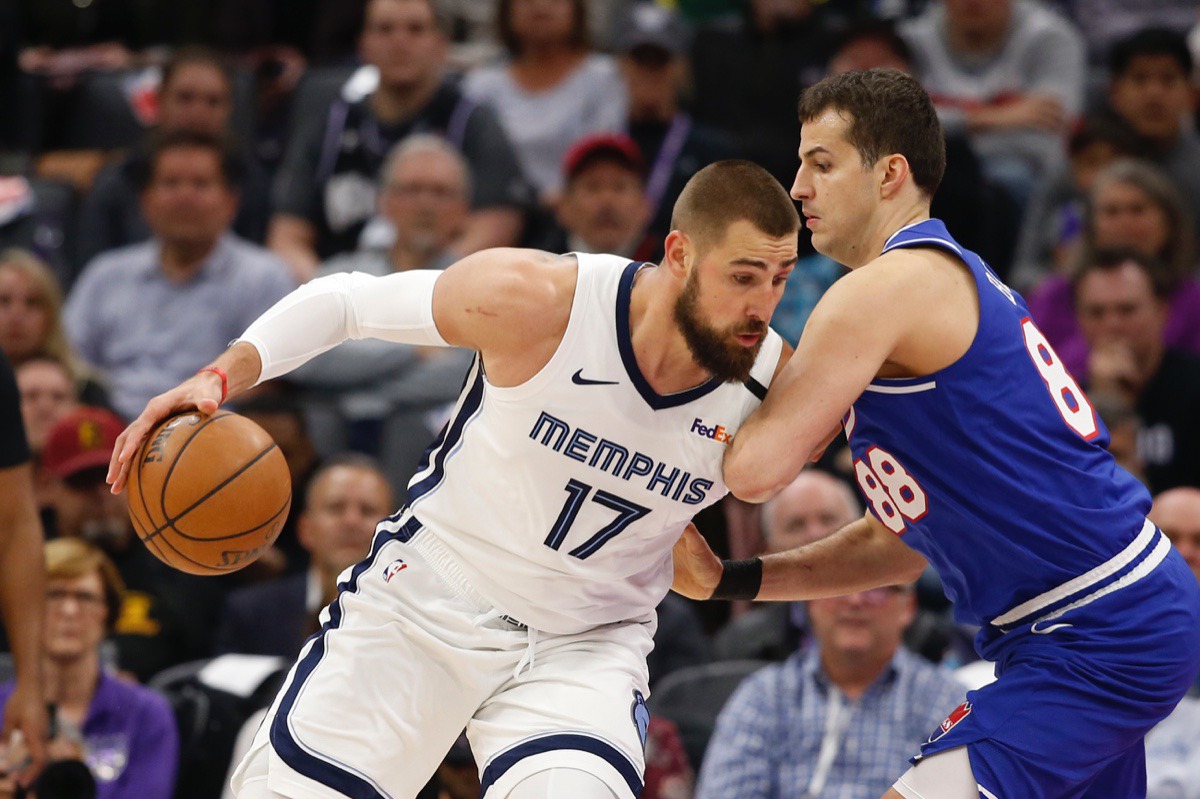 <strong>Memphis Grizzlies center Jonas Valanciunas, left, drives against Sacramento Kings forward Nemanja Bjelica Feb. 20, 2020.</strong> (Rich Pedroncelli/AP)