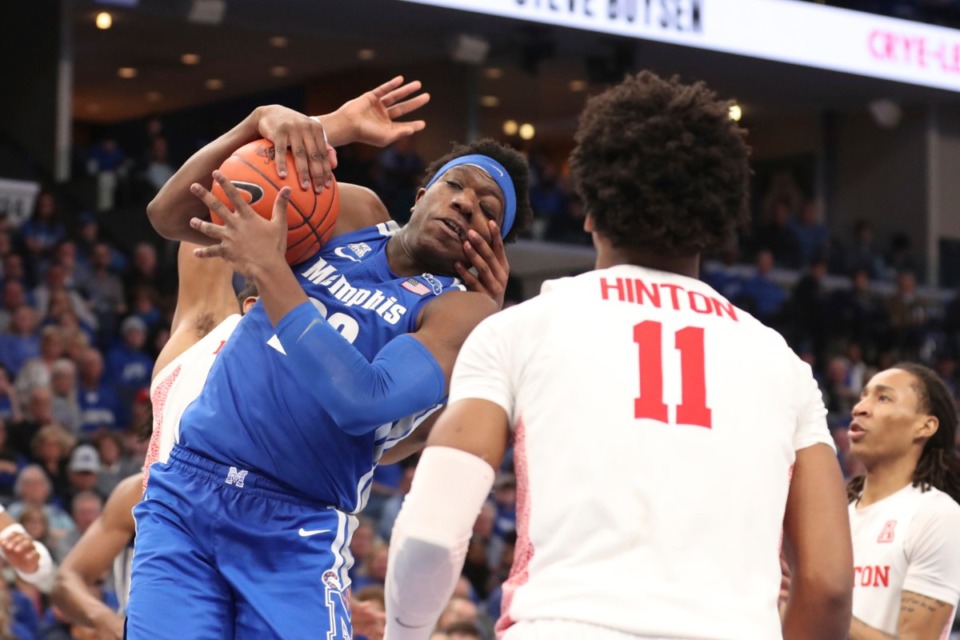 <strong>Memphis forward Malcolm Dandridge (23) goes up for a basket in the second half&nbsp;of the Tigers game against Houston on Feb. 22, 2020, in Memphis.</strong> (AP Photo/Karen Pulfer Focht)
