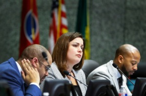 <strong>&ldquo;I think people should pay their fair share,&rdquo; said Commissioner Edmund Ford Jr. (left), who presented the ordinance. Eight commissioners including Amber Mills (center) and Mickell Lowery voted yes during the meeting Monday, Feb. 24, 2020.</strong> (Mark Weber/Daily Memphian)