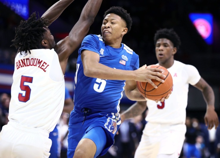<strong>University of Memphis guard Boogie Ellis (5) attacks the rim during a road game against the Southern Methodist University Mustangs in Dallas Feb. 25, 2020.</strong> (Patrick Lantrip/Daily Memphian)