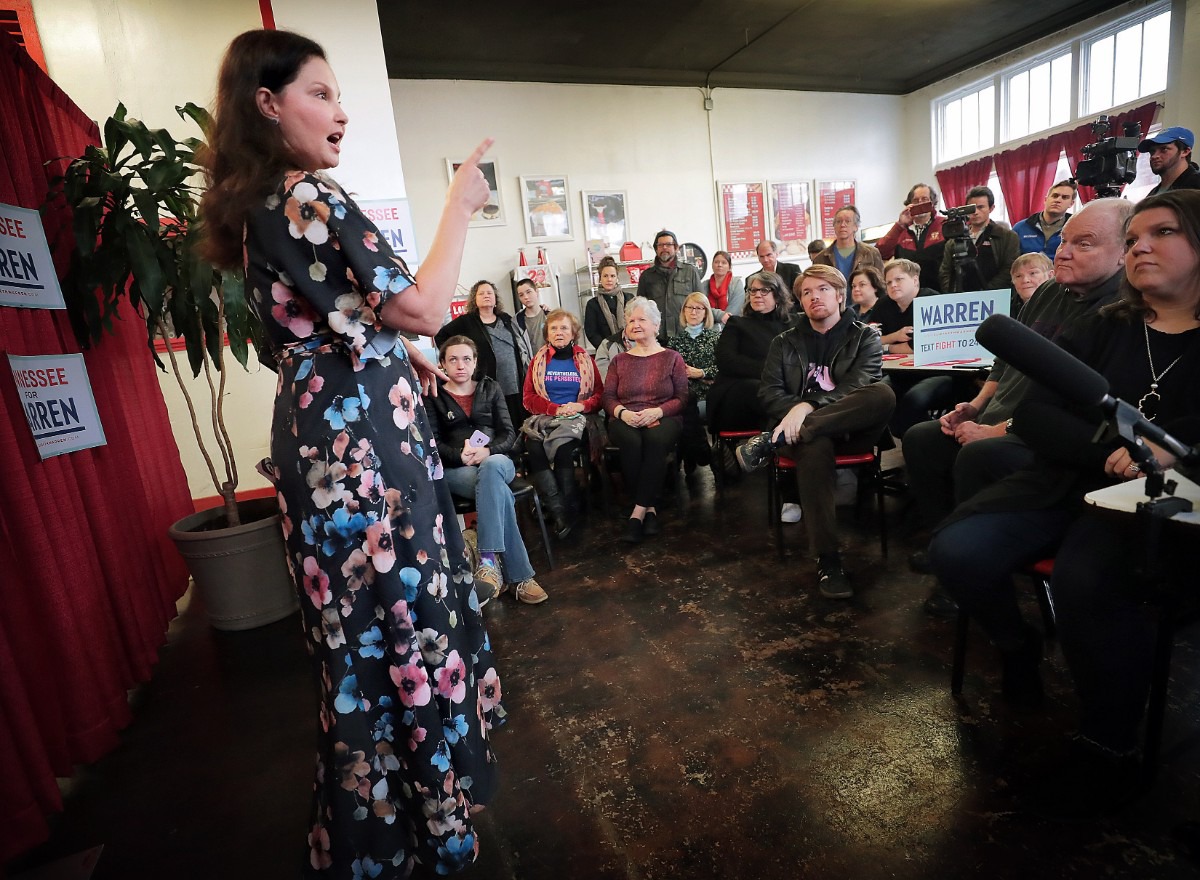 <strong>A crowd of Elizabeth Warren supporters listen as actor Ashley Judd draws comparisons between her life and that of the Massachusetts senator during a campaign rally at Makeda's Cookies on Feb. 26, 2020.</strong> (Jim Weber/Daily Memphian)