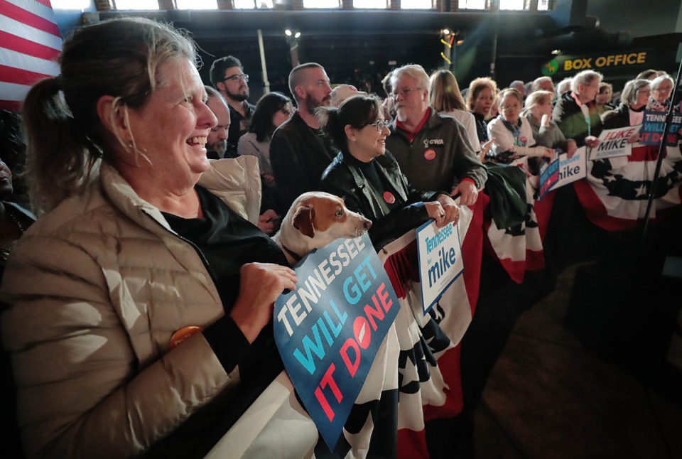 <strong>Robin Ross and her dog Ace join a crowd of Bloomberg supporters at Minglewood Hall as Democratic presidential contender Michael Bloomberg delivers his stump speech during a campaign stop in Memphis on Feb. 28, 2020.</strong> (Jim Weber/Daily Memphian)
