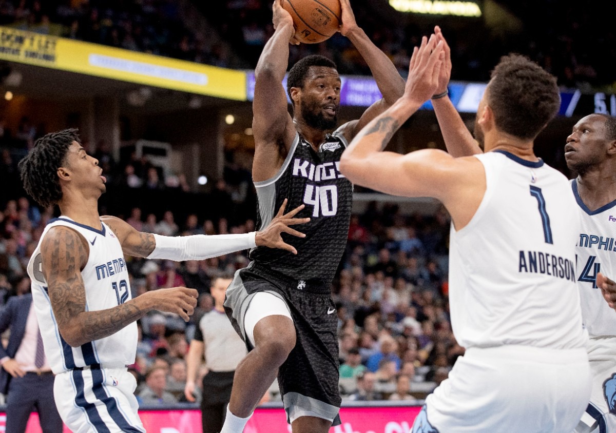 <strong>Sacramento Kings forward Harrison Barnes (40) looks to pass while defended by Memphis Grizzlies guard Ja Morant (12), forward Kyle Anderson (1) and center Gorge Dieng, right, Feb. 28, 2020, iat FedExForum.</strong> (Nikki Boertman/AP)