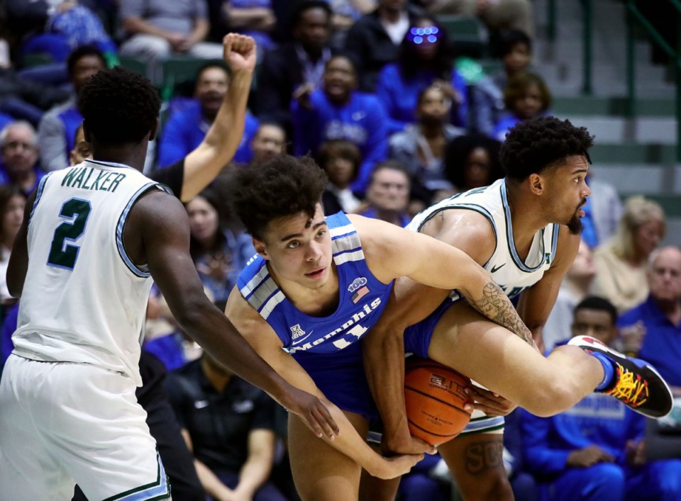 <strong>University of Memphis guard Lester Quinones (11) gets fouled during a road game against the Tulane University Green Wave in New Orleans Feb. 29, 2020.</strong> (Patrick Lantrip/Daily Memphian)