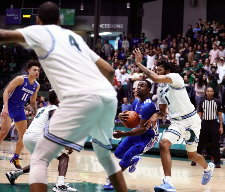 <strong>University of Memphis guard Alex Lomax (2) drives to the rim during a road game against the Tulane University Green Wave in New Orleans Feb. 29, 2020.</strong> (Patrick Lantrip/Daily Memphian)