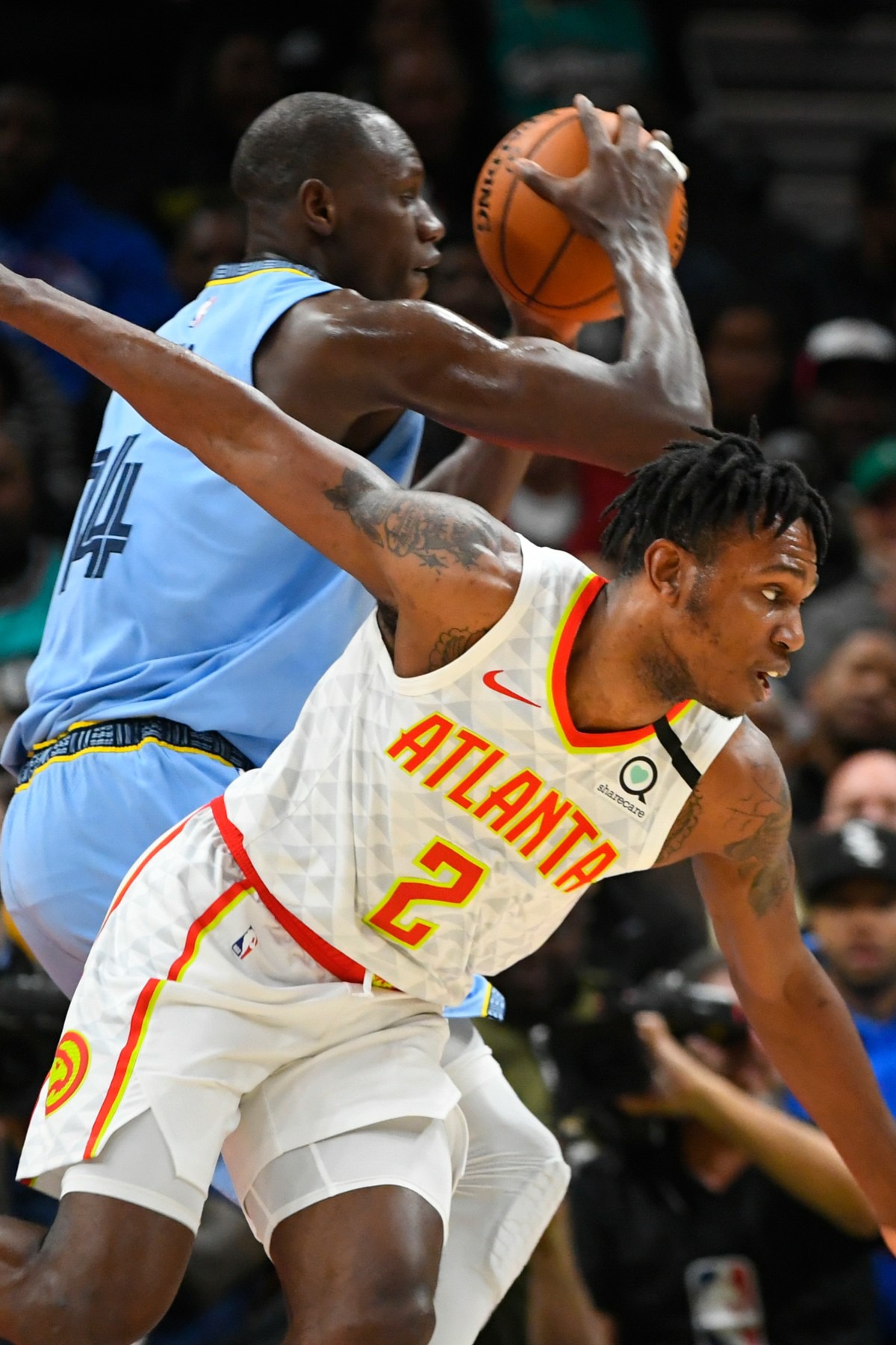 <strong>Atlanta Hawks guard Treveon Graham (2) defends against Memphis Grizzlies center Gorgui Dieng March 2, 2020, in Atlanta.</strong>&nbsp;(John Amis/AP)