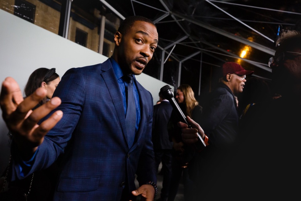 <strong>Actors and producers of the film "The Banker" &mdash; Anthony Mackie, Samuel L. Jackson, and other film industry names &mdash; walk the Apple TV+ film red carpet at the National Civil Rights Museum on March 2, 2020.</strong> (Ziggy Tucker/Daily Memphian)
