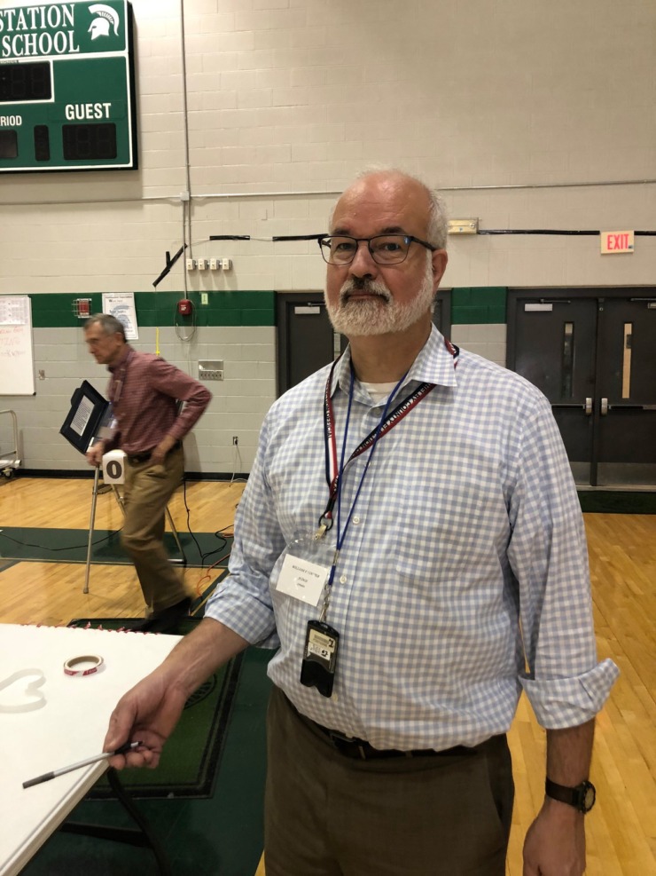 <strong>Will Cooper, who has worked the same poll for about 10 years, was moving voters through Tuesday morning at White Station Middle School.&nbsp; </strong>(Jennifer Biggs/Daily Memphian)