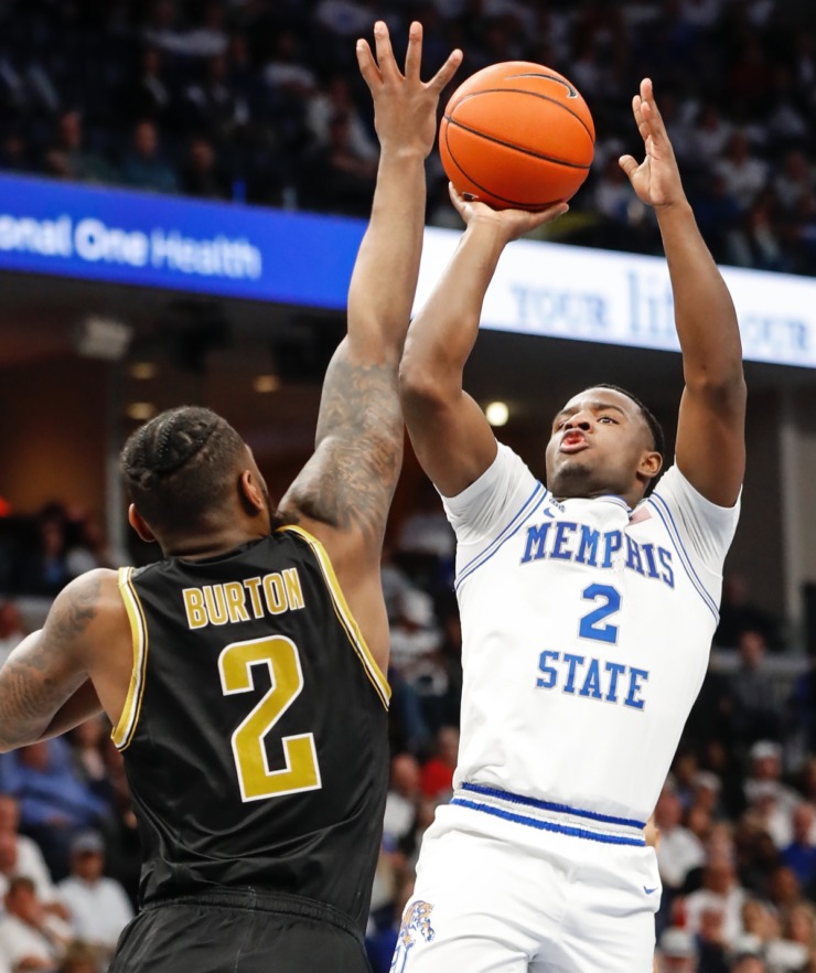<strong>Memphis guard Alex Lomax (right) hits a shot in front of Wichita State's Jamarius Burton (left) March 5, 2020, at FedExForum.</strong> (Mark Weber/Daily Memphian)