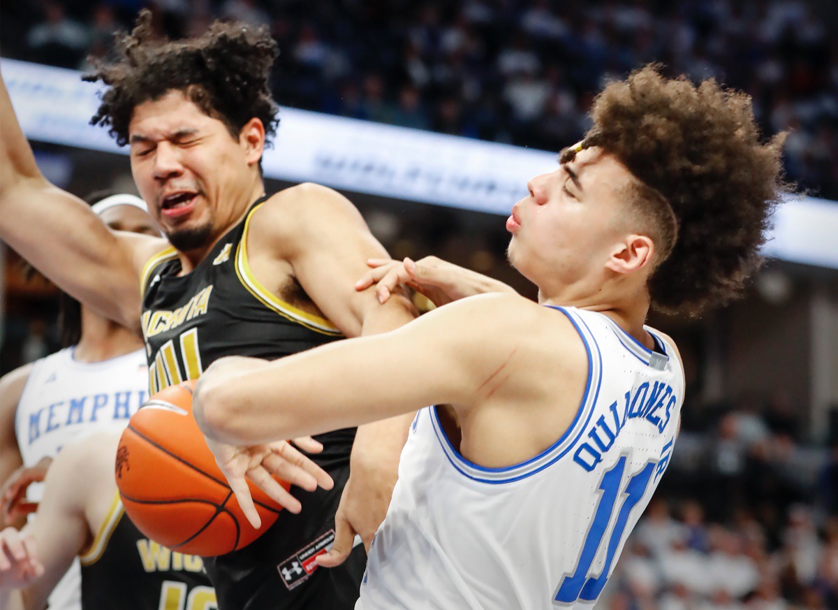 <strong>Memphis guard Lester Quinones (right) is fouled by Wichita State's Isaiah Poor Bear-Chandler (left) March 5, 2020, at FedExForum.</strong> (Mark Weber/Daily Memphian)