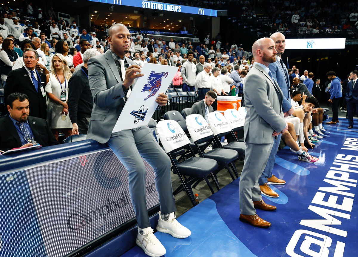 <strong>Tiger head coach Penny Hardaway (left) works on a whiteboard before the Memphis-Wichita State game Thursday, March 5, 2020, at FedExForum.</strong> (Mark Weber/Daily Memphian)