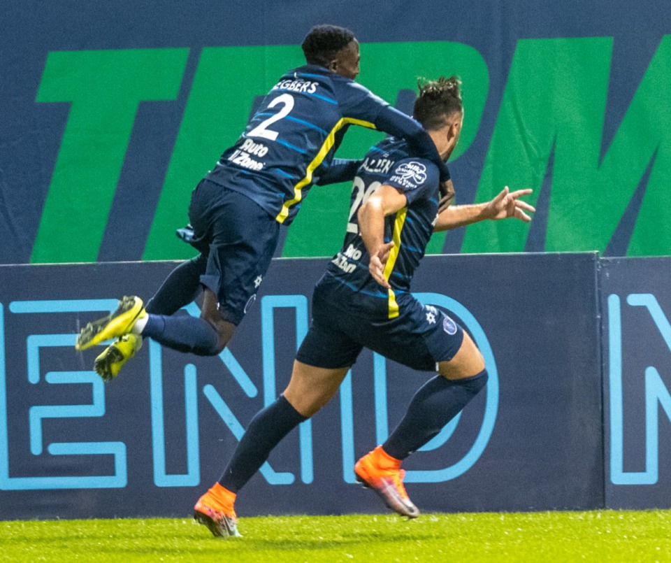 <strong>Memphis 901 FC teammates Mark Segbers and Brandon Allen celebrate after Allen scored an early goal against Indy Eleven in the season opener at AutoZone Park Saturday, March 7, 2020.</strong> (Greg Campbell/Special to The Daily Memphian)